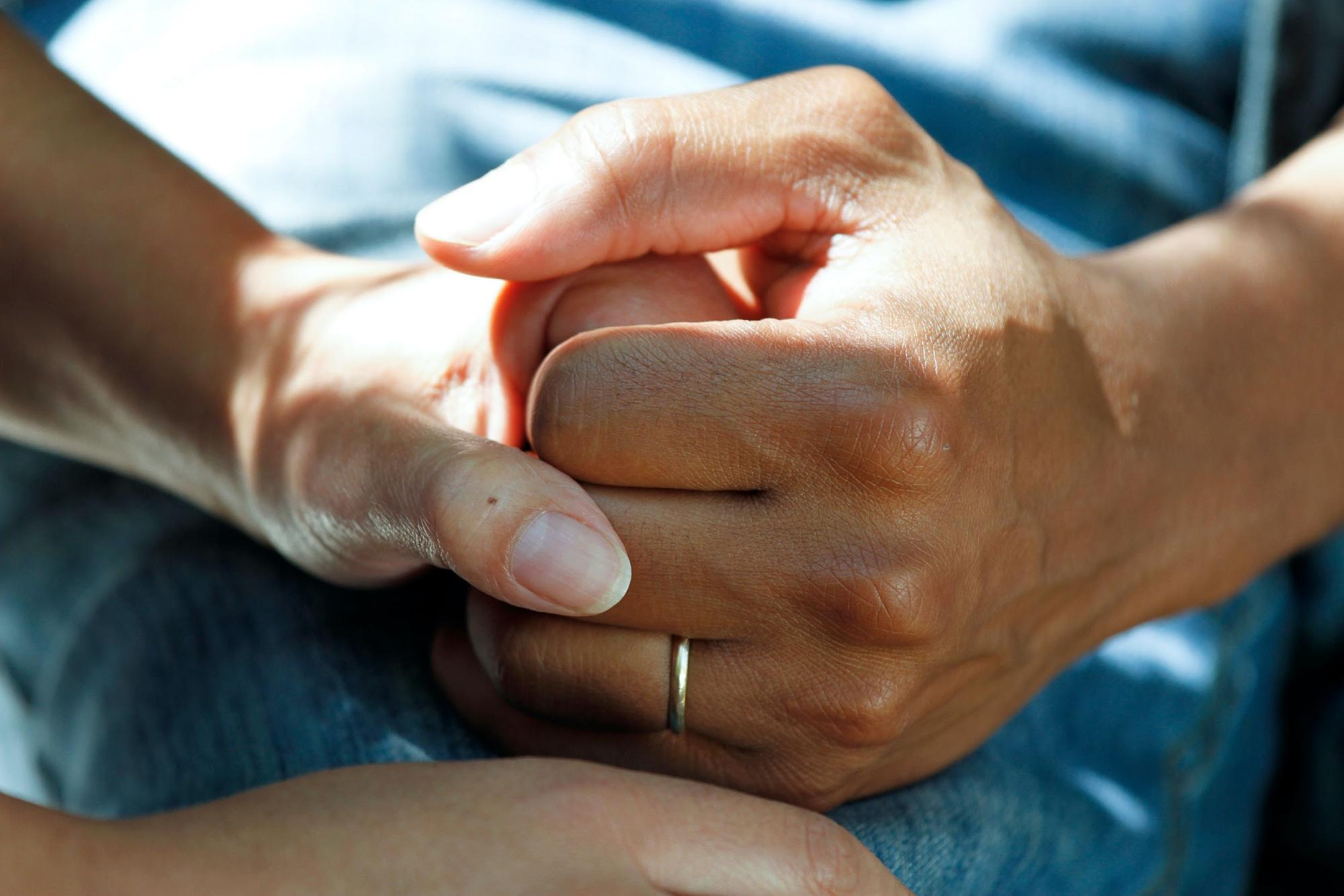 Hand holding - dementia support Australia
