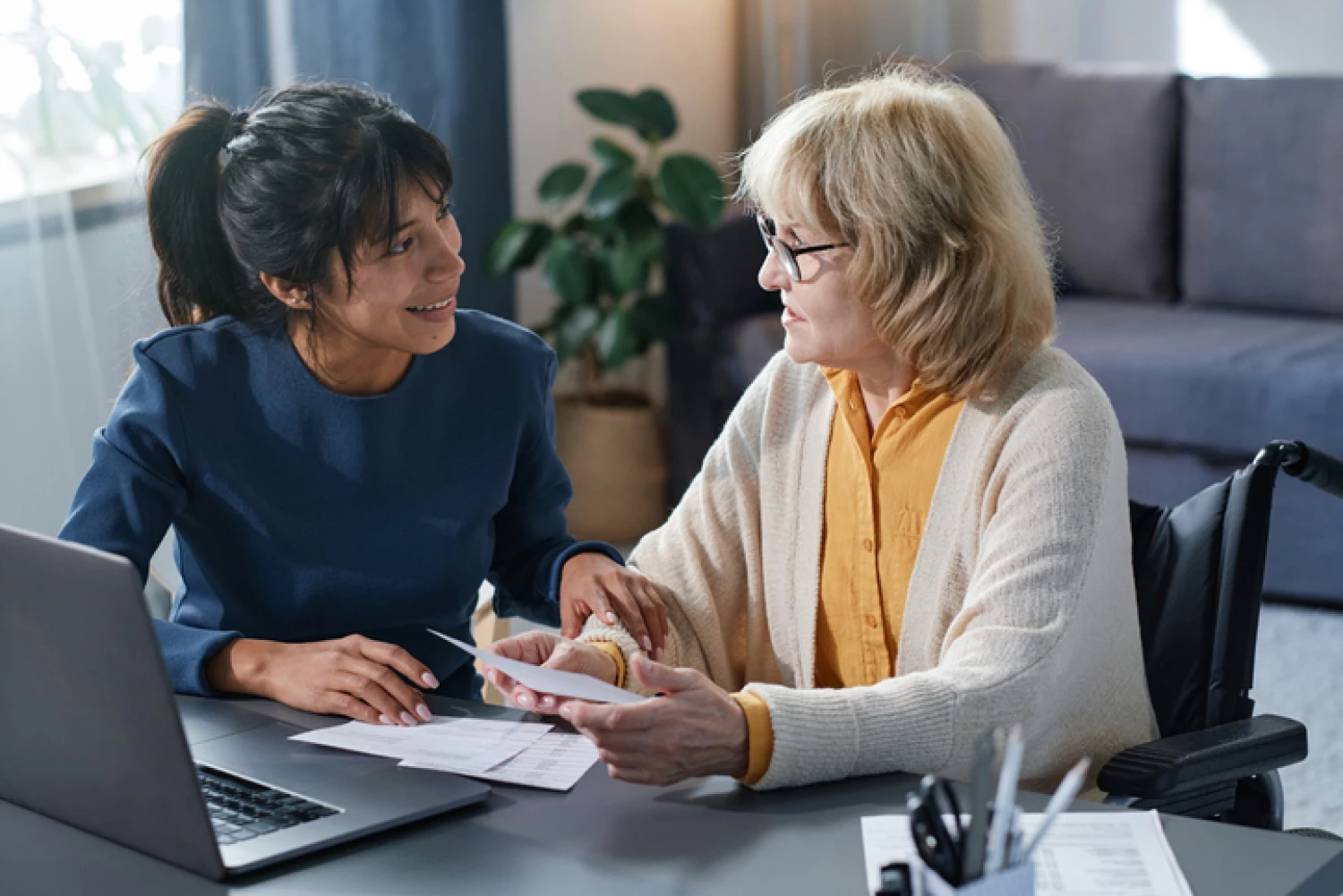 Care professional discussing tailored care options for her a Level 1 home care package with an elderly woman.