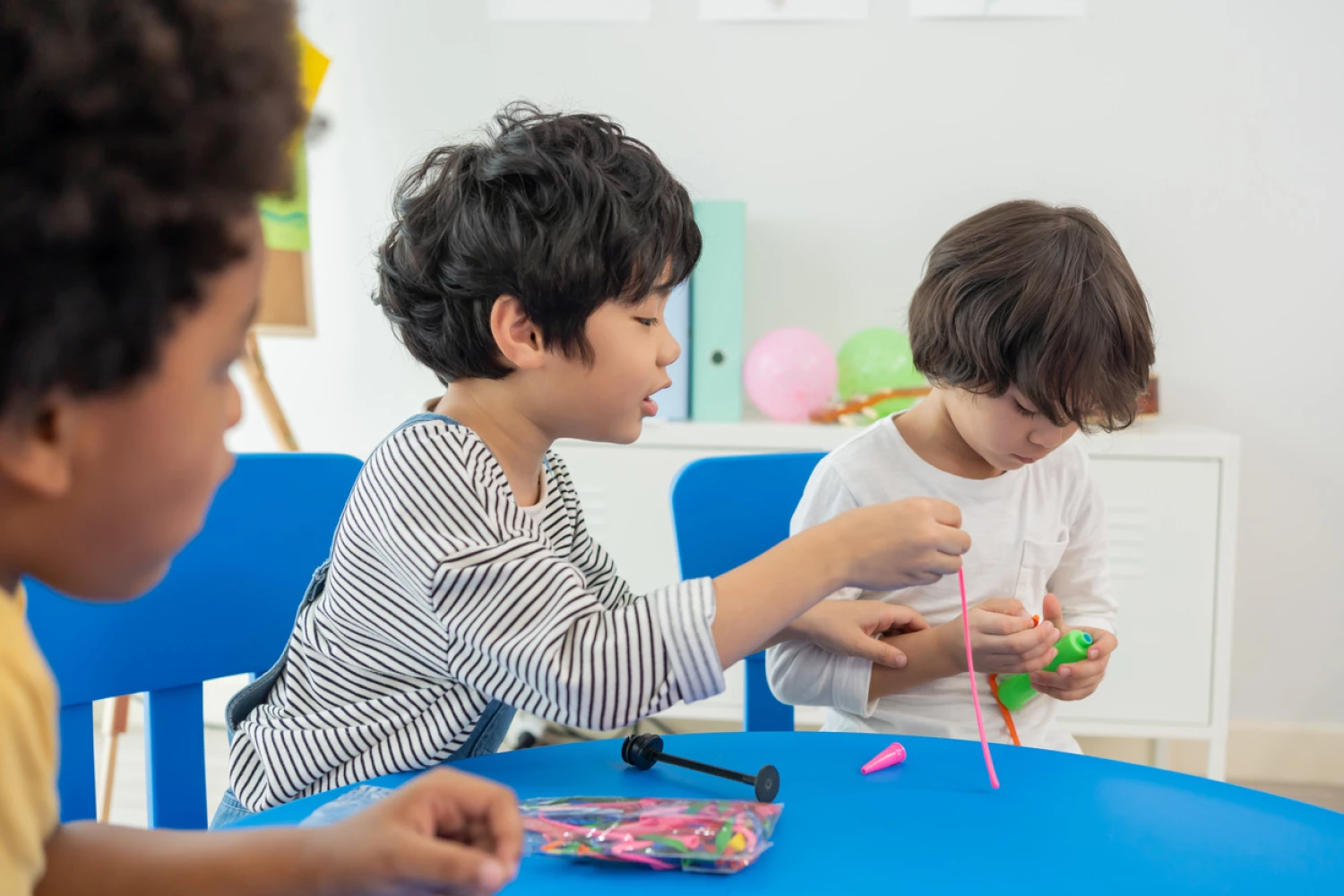 Signs of autism in little boy not playing well with others