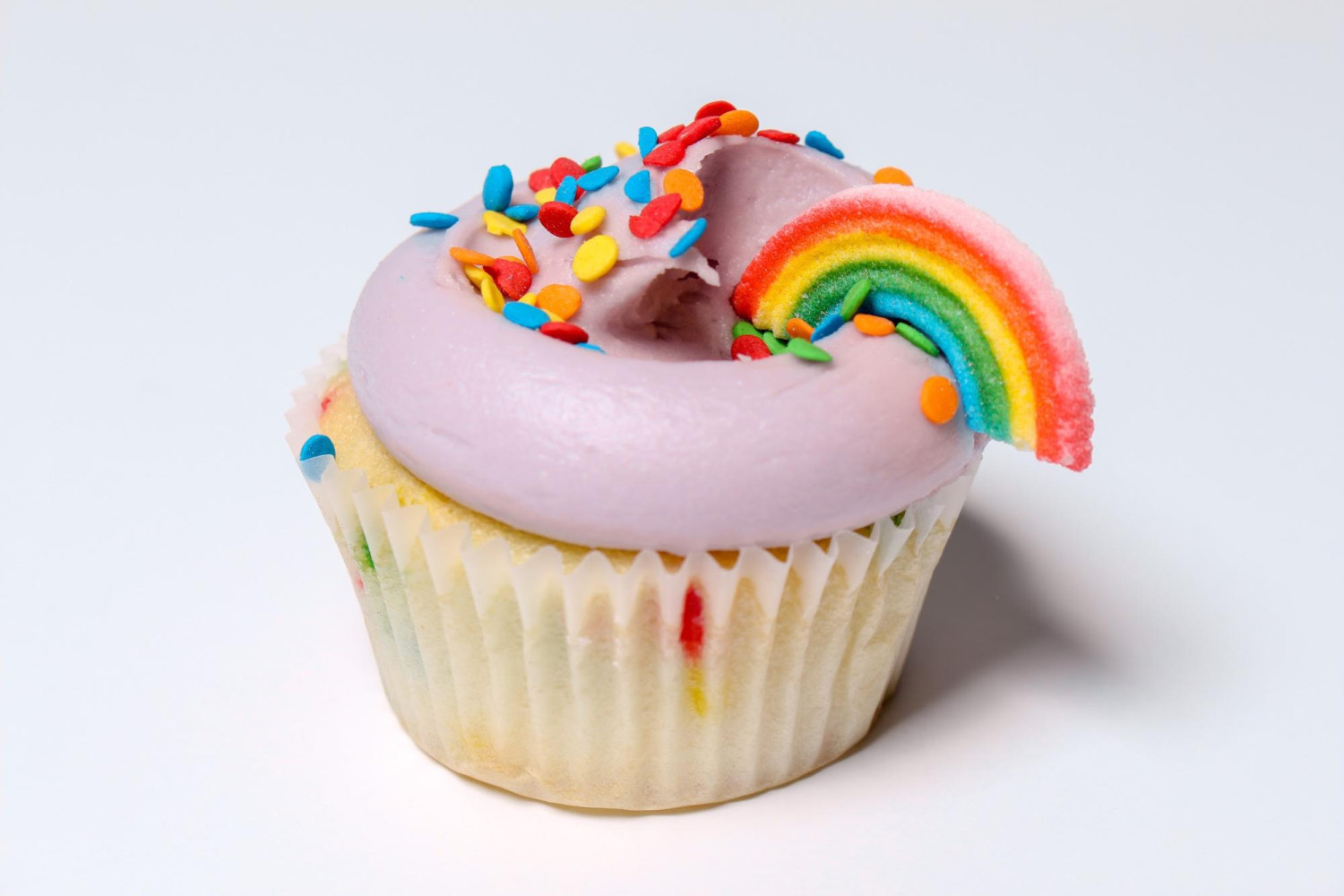 Rainbow cupcake with pastel purple frosting - Lockdown Entertainment Guide Food Edition