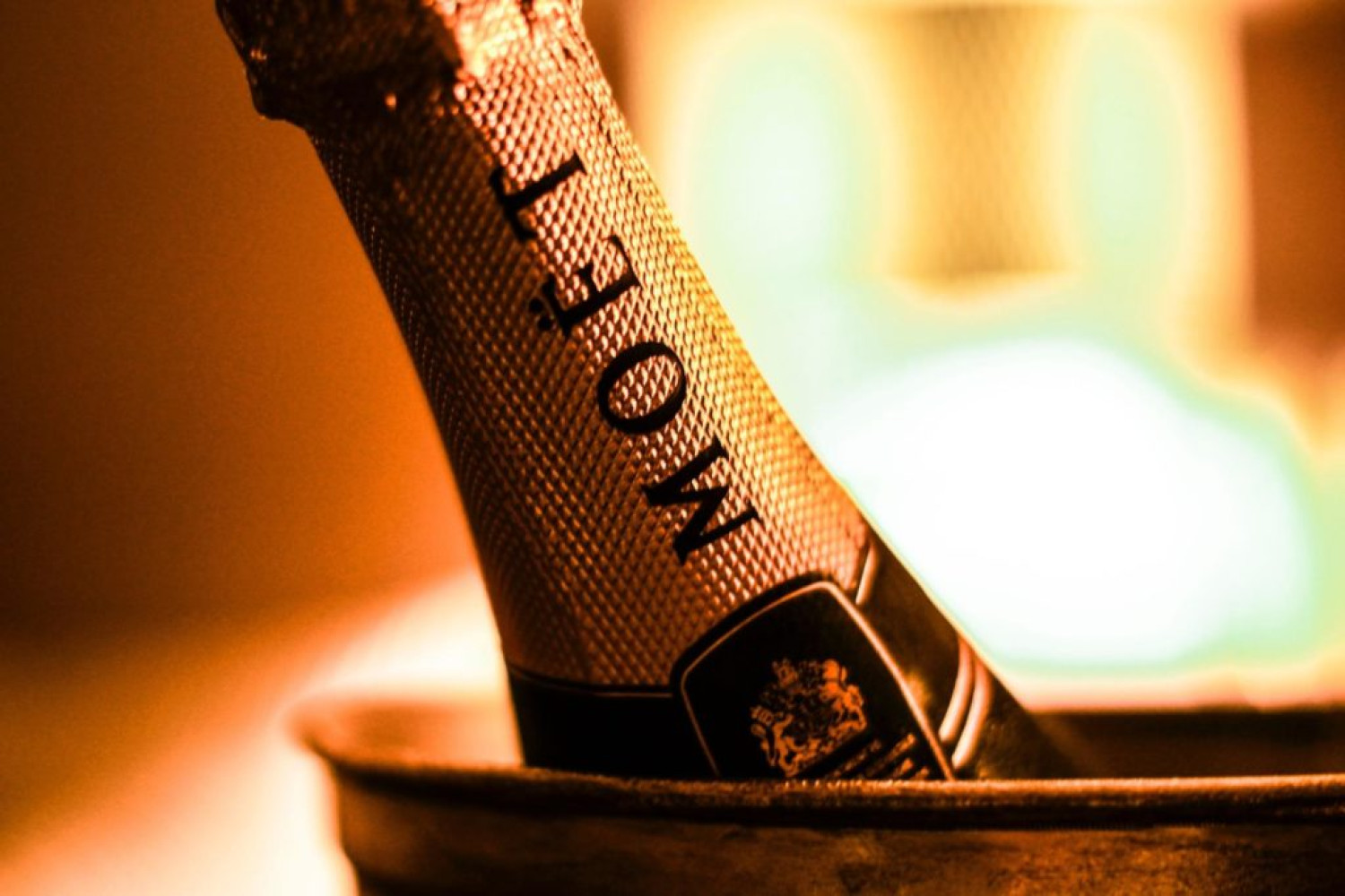 Artistic shot of the top of a bottle of Moet - Cocktail & alcohol delivery - Celebrating during Covid19 lockdown