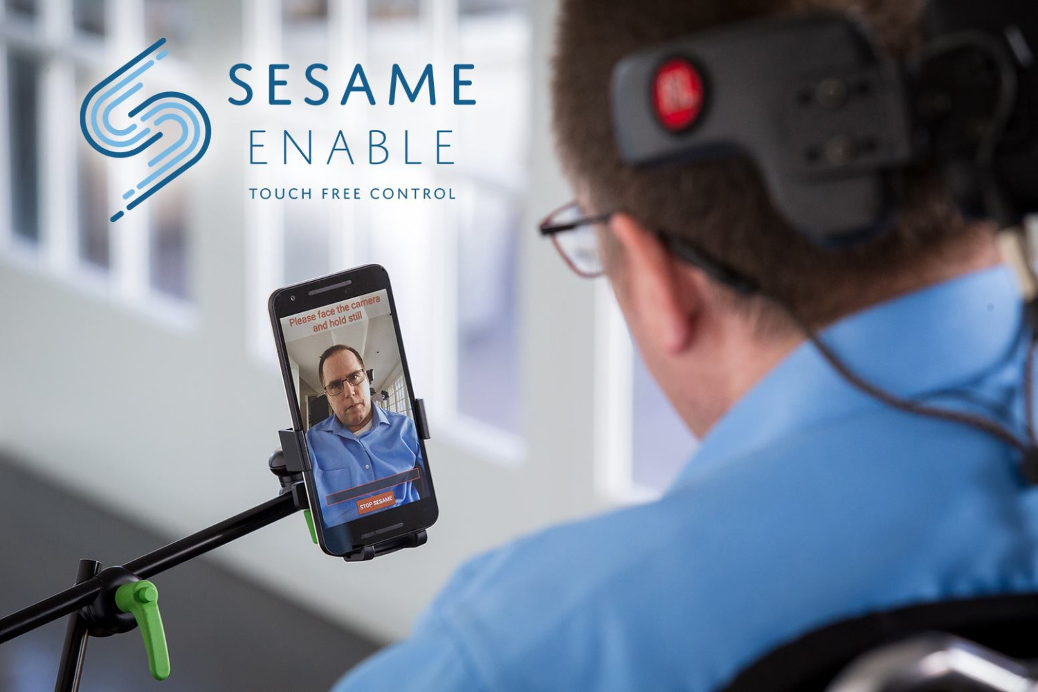 Sesame Enable hands-free mobile device being used by man in wheelchair