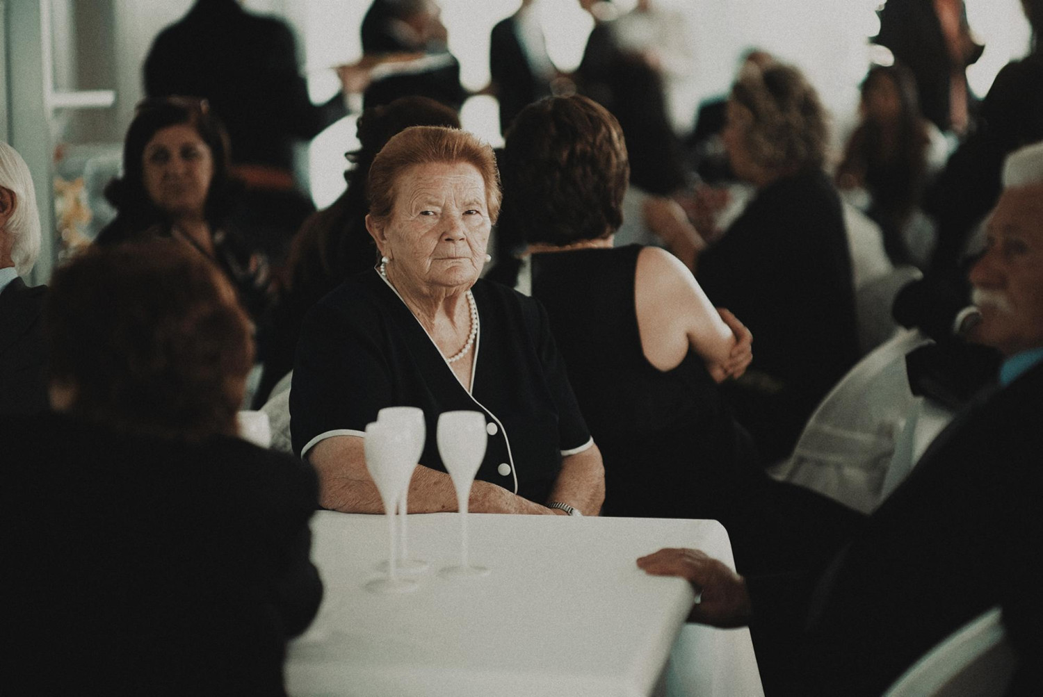 Older lady dressed in black at social function - Focus Care